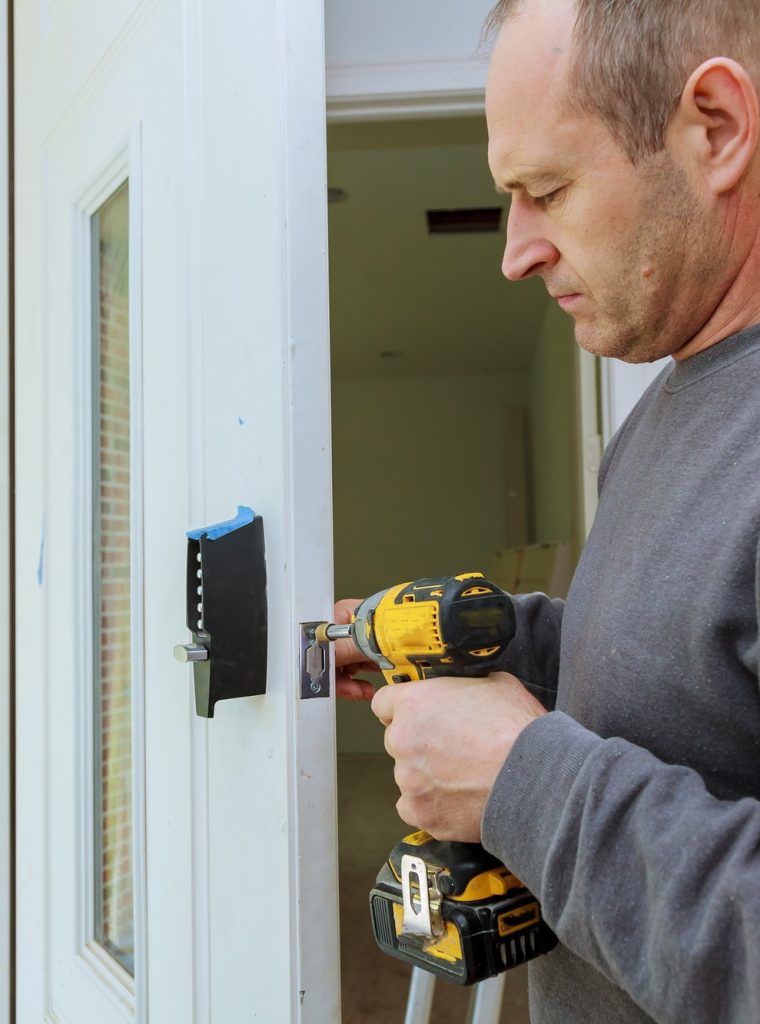 installation-locked-interior-door-woodworker-hands-install-lock-installation-of-the-door-lock-.jpg